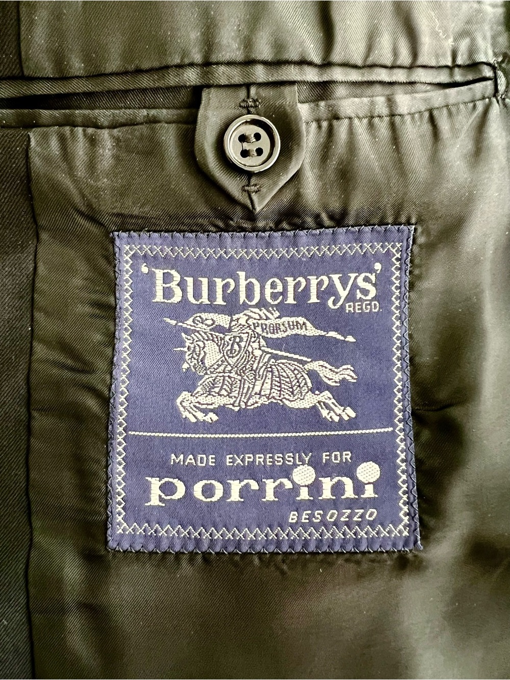 Burberry Men's Black Sports Coat with Gold Buttons.